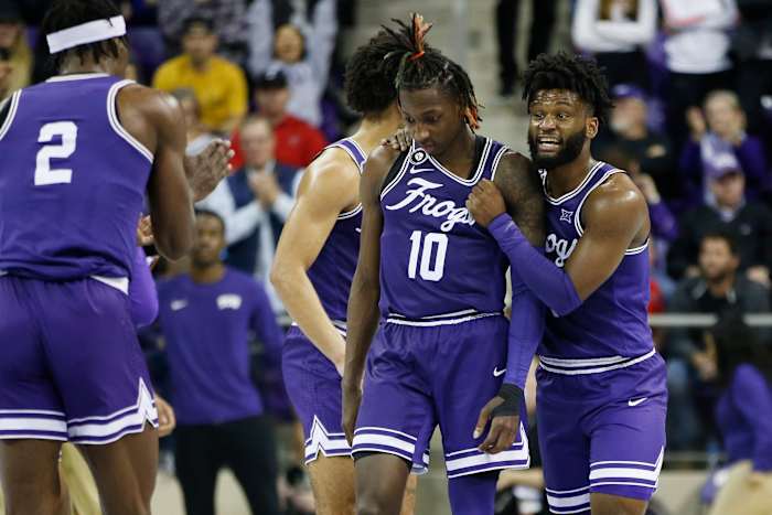 Feb 26, 2022; Fort Worth, Texas, USA; TCU Horned Frogs guard Mike Miles (1) reacts with guard Damion Baugh (10) in the second half against the Texas Tech Red Raiders at Ed and Rae Schollmaier Arena. Mandatory Credit: Tim Heitman-USA TODAY Sports